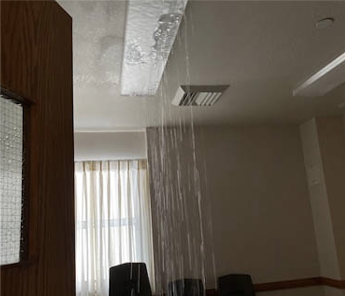 water falling from ceiling