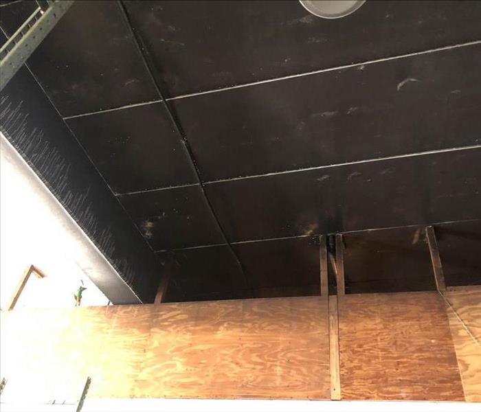Soot damage on ceiling.