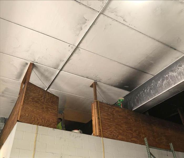 Fire damage on commercial ceiling. 